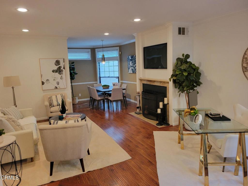832 Magnolia Avenue, Unit 2 Pasadena, CA 91106 - Photo 3 of 20 a living room with furniture and a fireplace