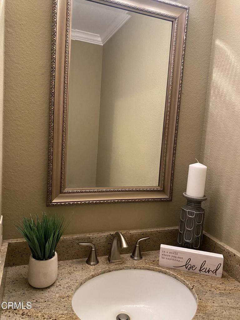 832 Magnolia Avenue, Unit 2 Pasadena, CA 91106 - Photo 9 of 20 a bathroom with a sink and a mirror