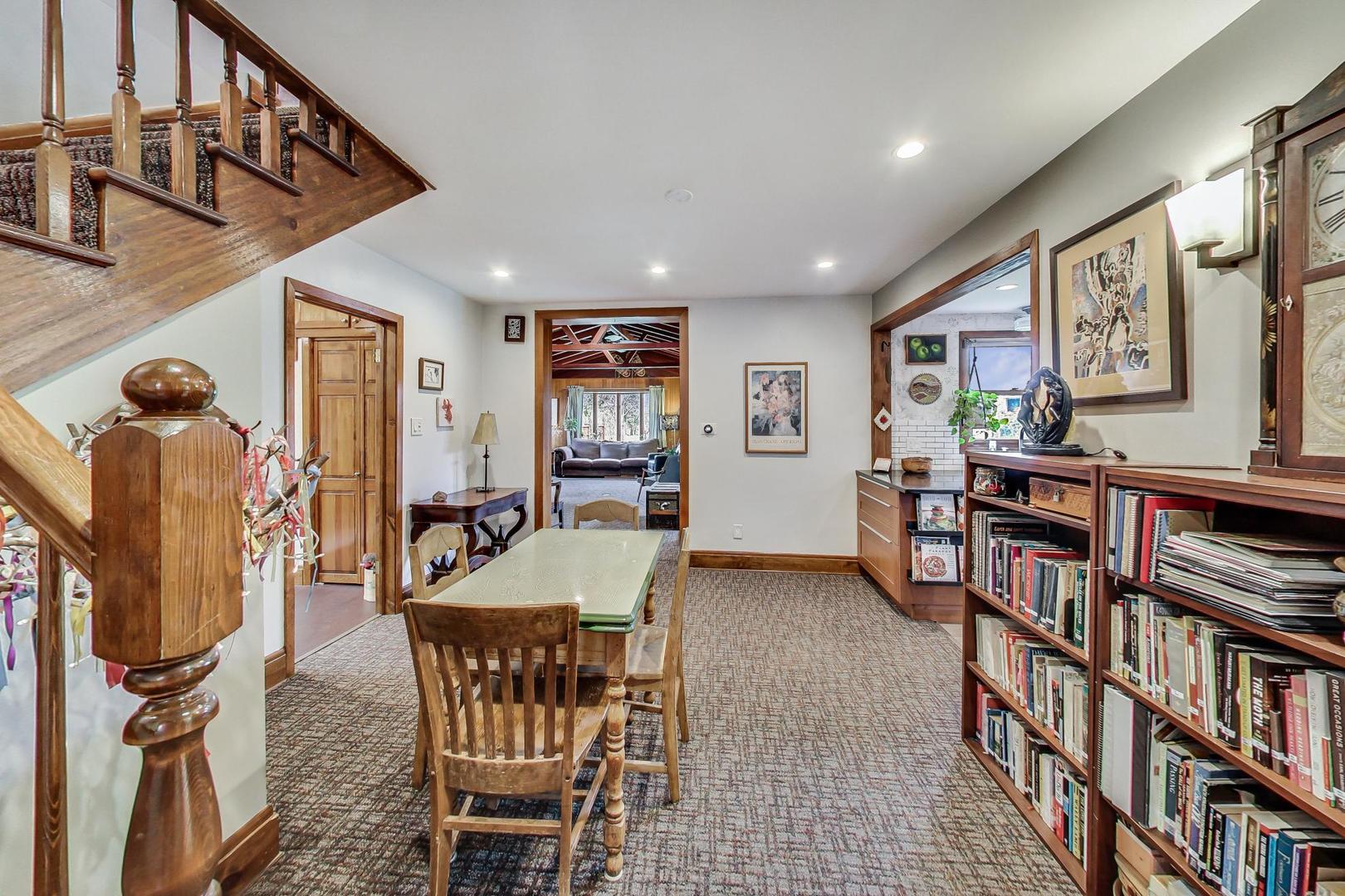 208 Waubansee Road Riverside, IL 60546 - Photo 12 of 38 a view of a livingroom with furniture and workspace