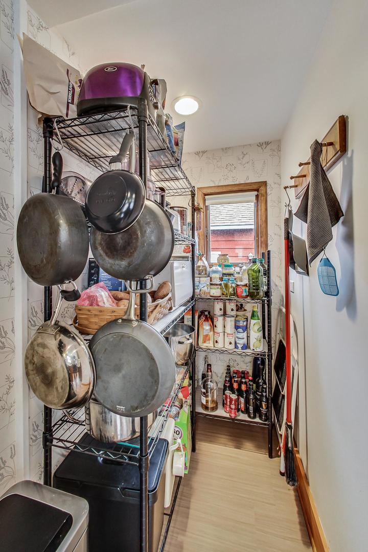 208 Waubansee Road Riverside, IL 60546 - Photo 17 of 38 a kitchen with a stove and a fan