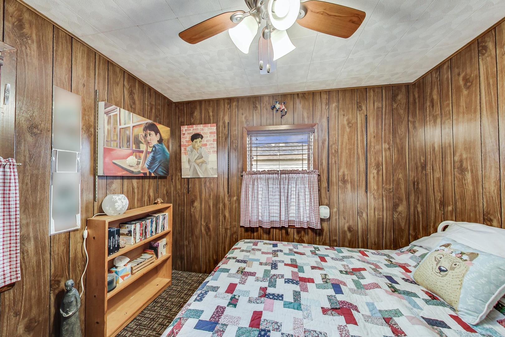 208 Waubansee Road Riverside, IL 60546 - Photo 24 of 38 a bedroom with a bed and a window
