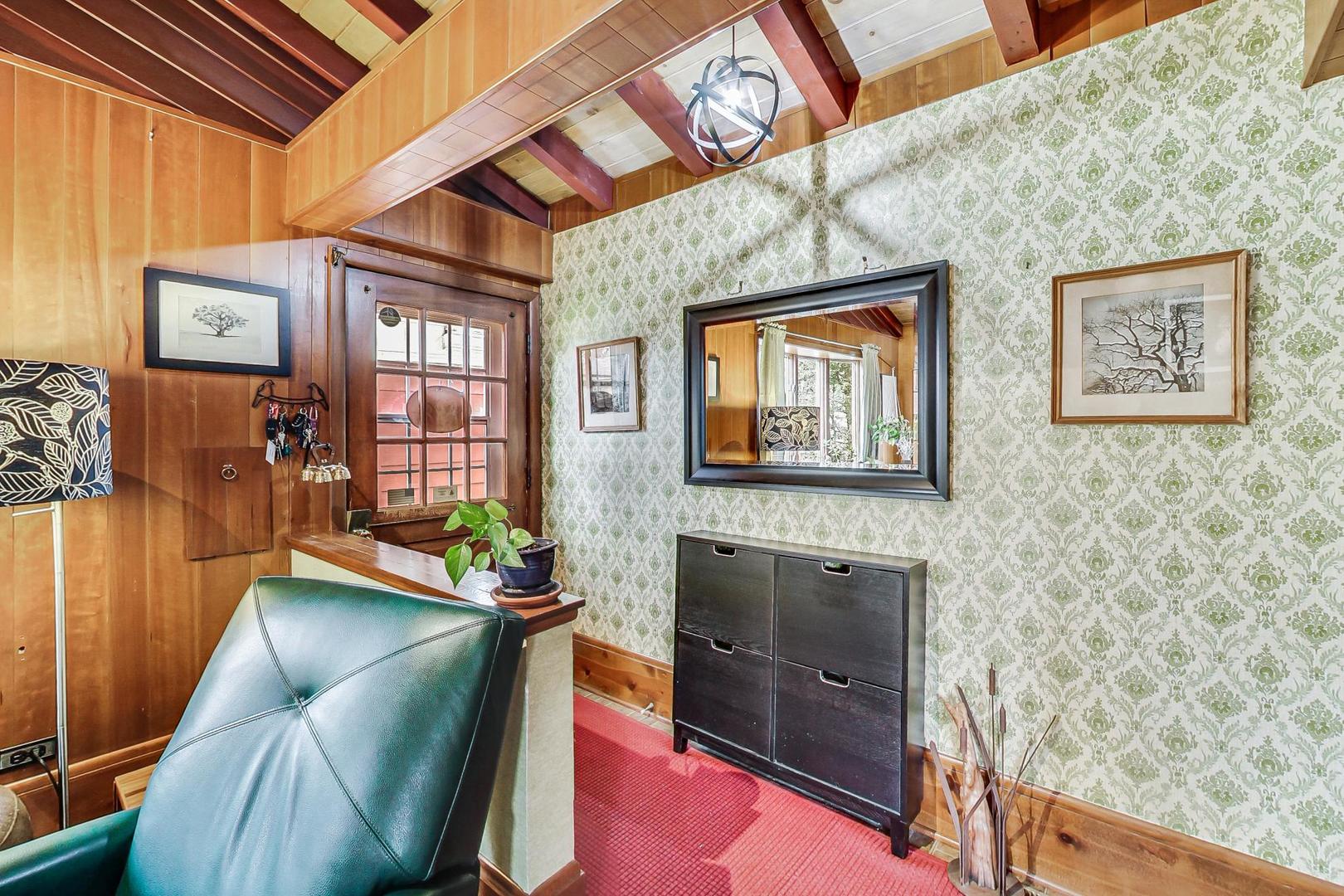 208 Waubansee Road Riverside, IL 60546 - Photo 9 of 38 a room with furniture and a fireplace