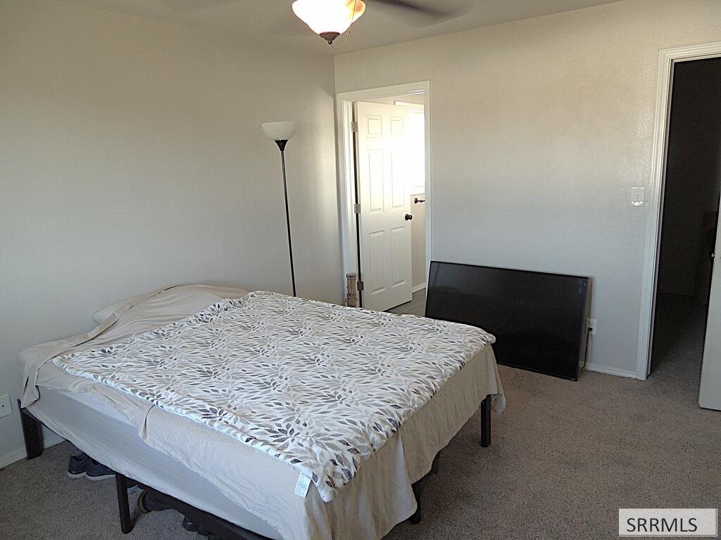 27 North White Pne Lane Rigby, ID 83442 - Photo 22 of 25 Bedroom 3 - also with large window
