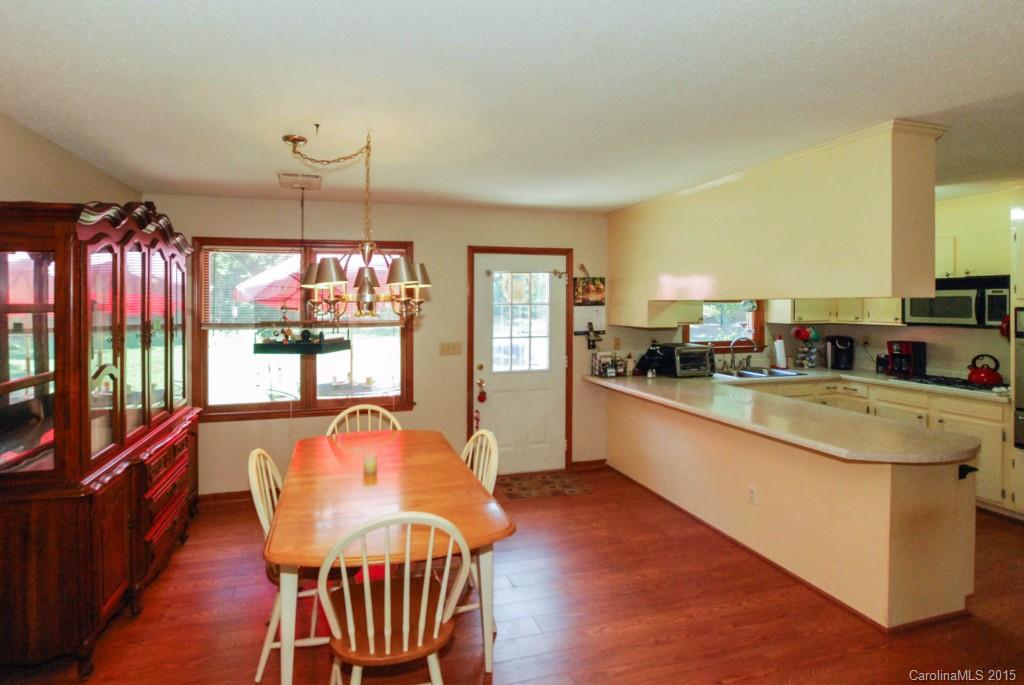 2256 Lawrence Road, Unit 7 Clover, SC 29710 - Photo 8 of 18 a large kitchen with lots of counter space and breakfast area