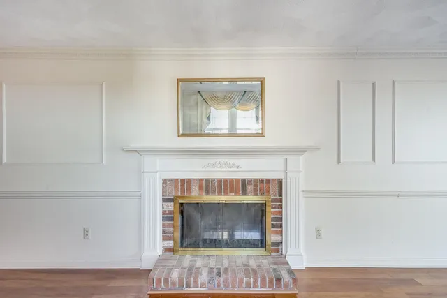 a living room with a fireplace