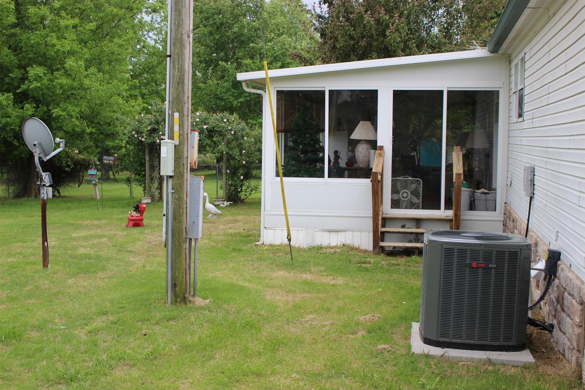 2049 Sugar Camp Road Springfield, TN 37172 - Photo 6 of 6 a view of a house with backyard and porch