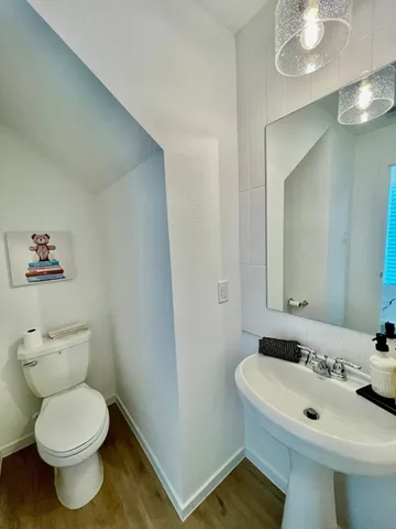 a bathroom with a sink and a toilet