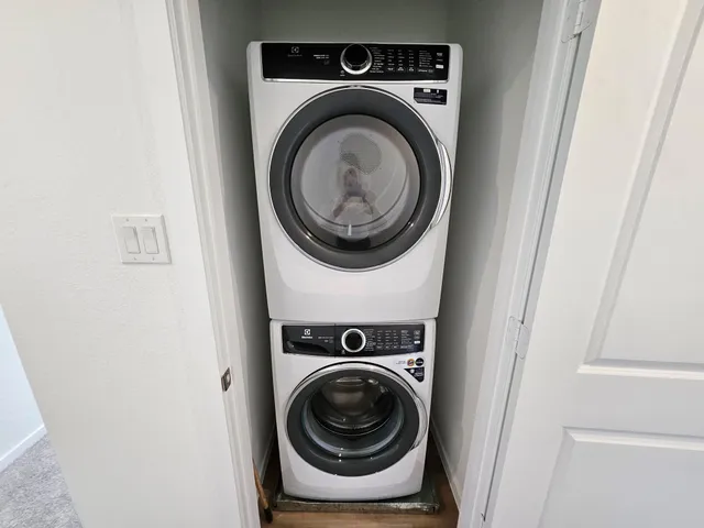 a utility room with dryer and washer