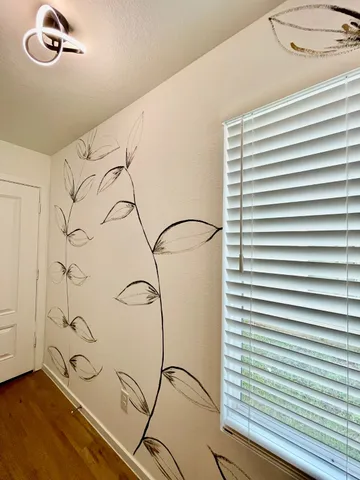 a view of a room with a window