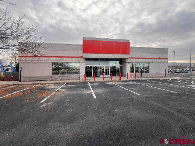 a view of a building with a street