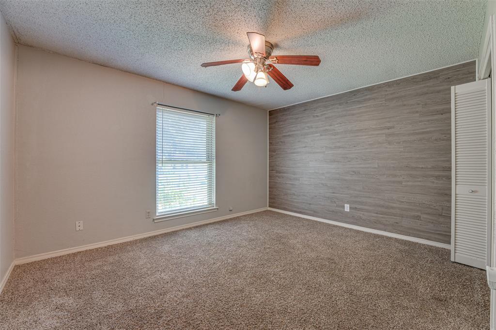 903 Walnut Street Royse City, TX 75189 - Photo 12 of 28 a view of an empty room with a window