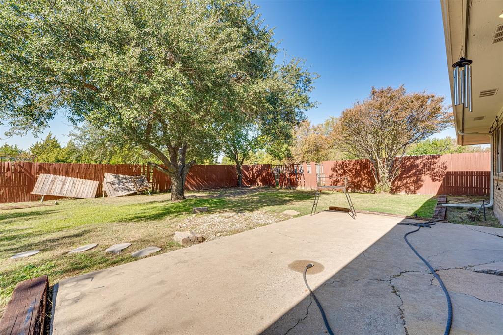 903 Walnut Street Royse City, TX 75189 - Photo 24 of 28 a view of a yard with a house
