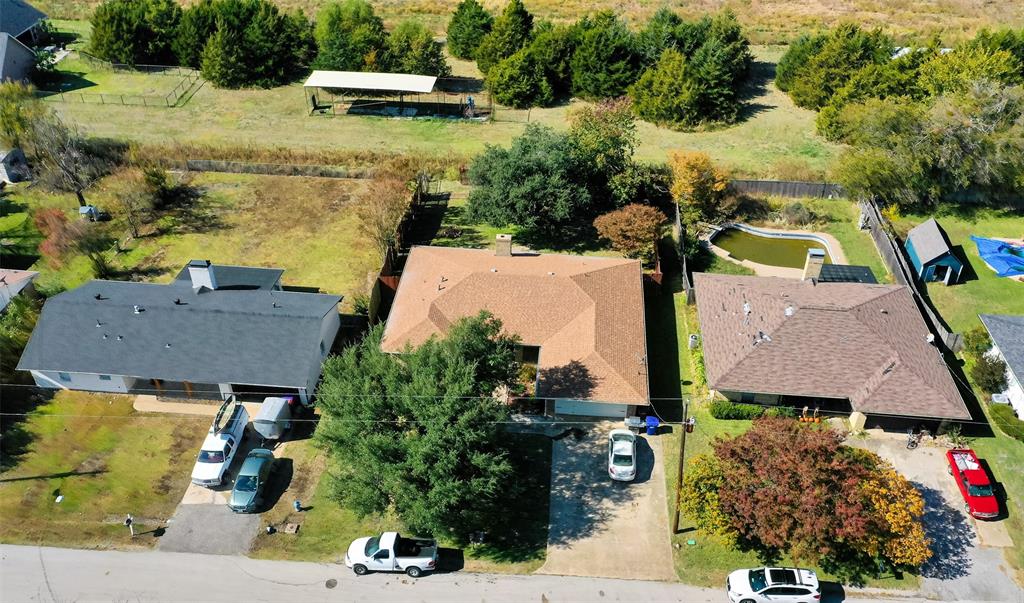 903 Walnut Street Royse City, TX 75189 - Photo 25 of 28 an aerial view of houses with yard