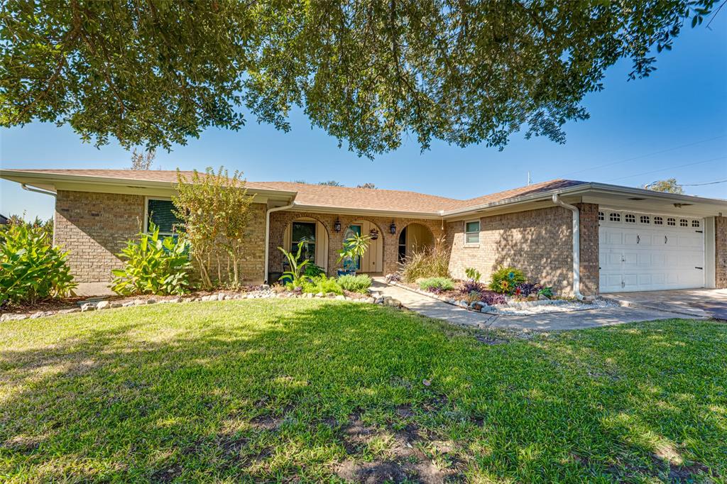 903 Walnut Street Royse City, TX 75189 - Photo 28 of 28 a front view of a house with garden and porch