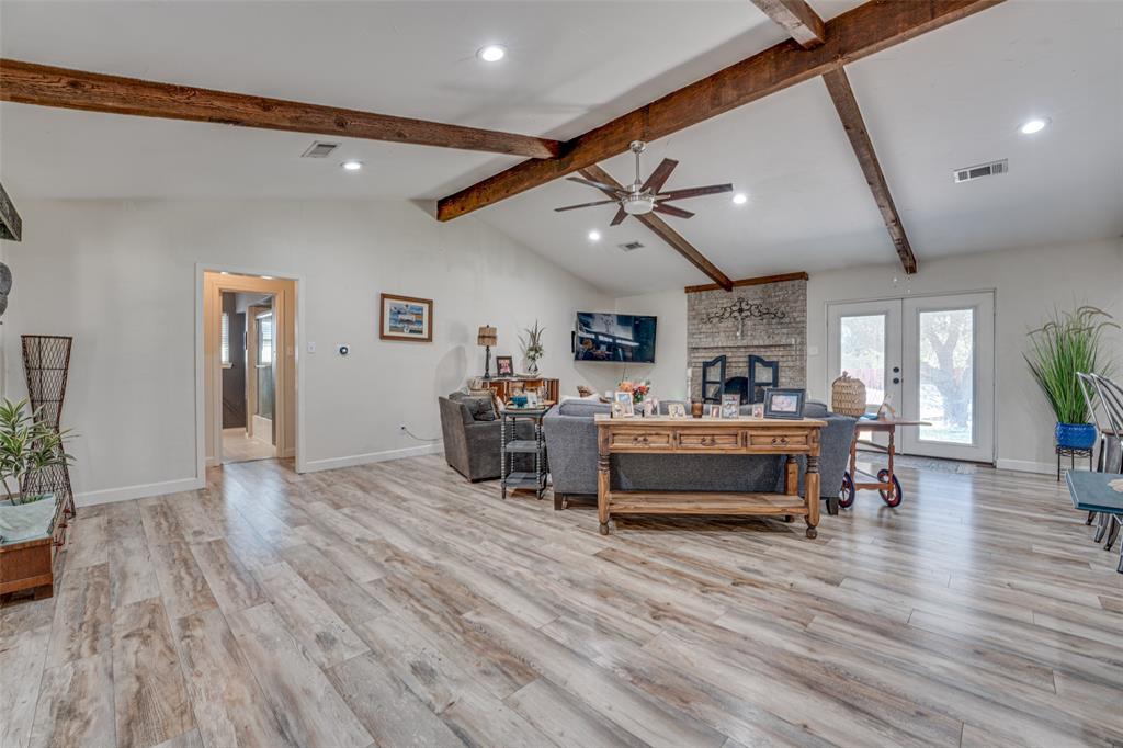 903 Walnut Street Royse City, TX 75189 - Photo 7 of 28 a living room with furniture and a wooden floor