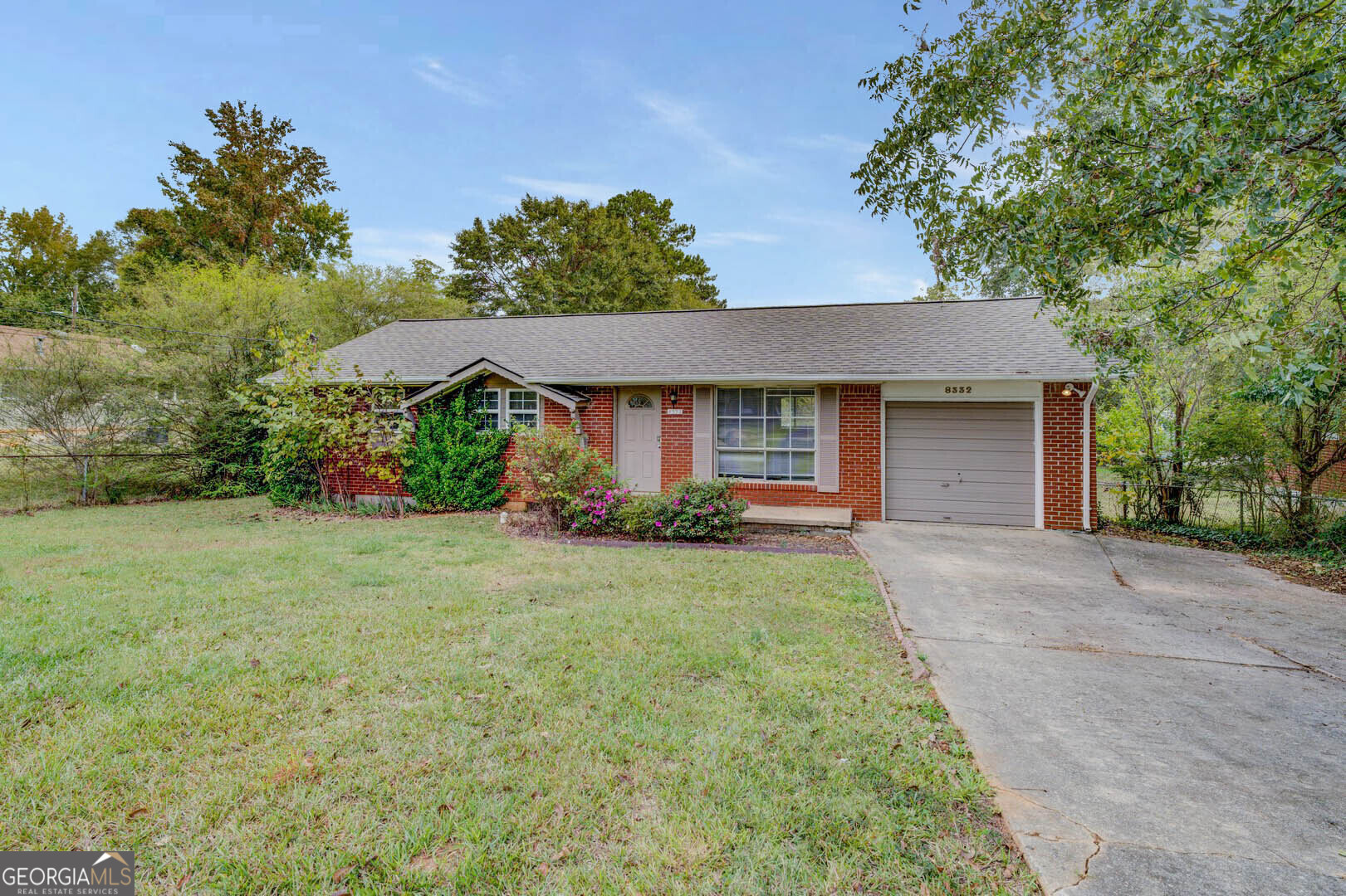 8332 Kendrick Road Jonesboro, GA 30238 - Photo 1 of 1 front view of a house with a yard