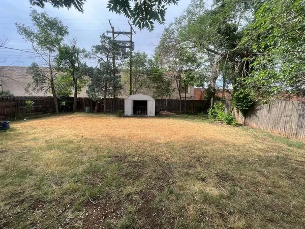 a view of outdoor space yard and swimming pool