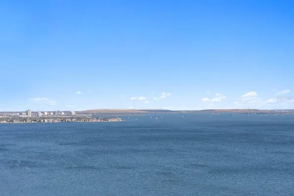 a view of an ocean from a balcony
