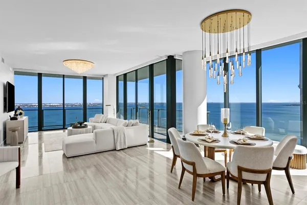 a kitchen with sink and refrigerator