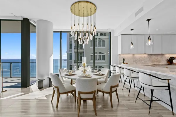a bathroom with a sink mirror vanity and toilet