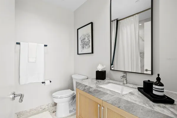 a view of a city skyline from a balcony