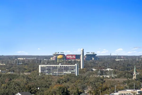 a view of a city with tall buildings