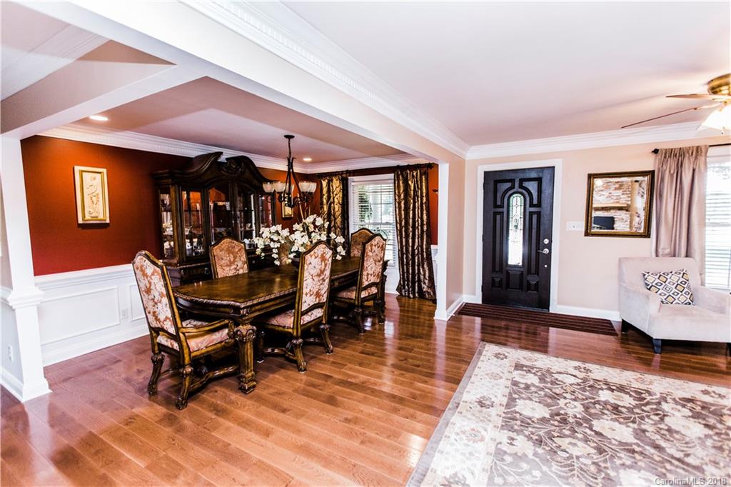 9225 Belt Road Midland, NC 28107 - Photo 2 of 14 a dining room with furniture and wooden floor