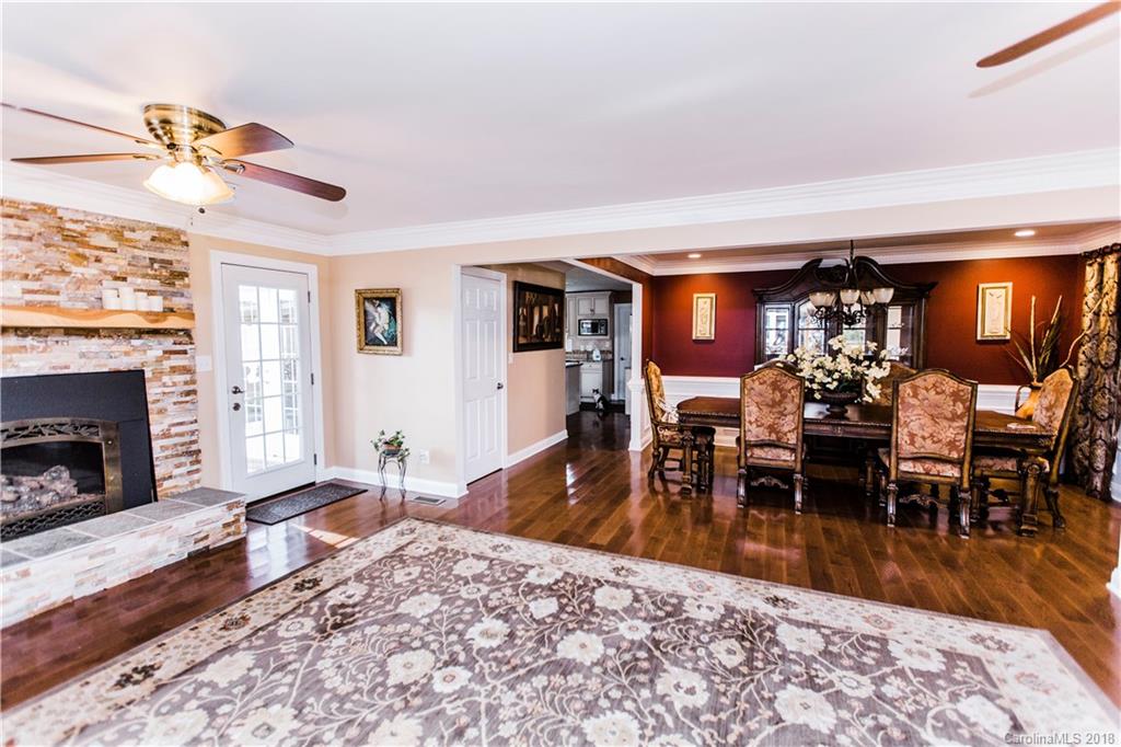9225 Belt Road Midland, NC 28107 - Photo 4 of 14 a living room with furniture and a fireplace