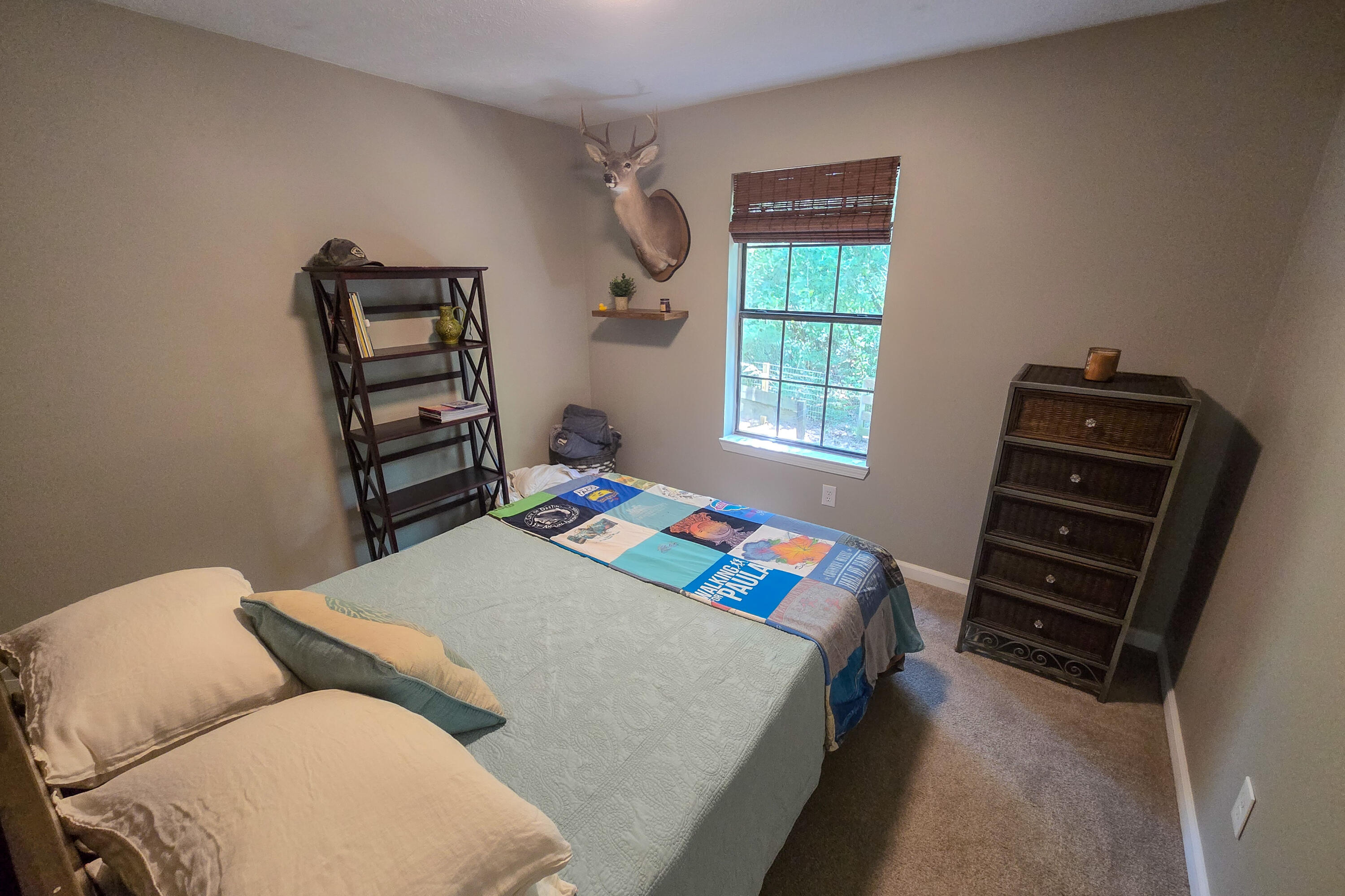 696 Phillips Drive Freeport, FL 32439 - Photo 21 of 49 a bedroom with a bed and a window
