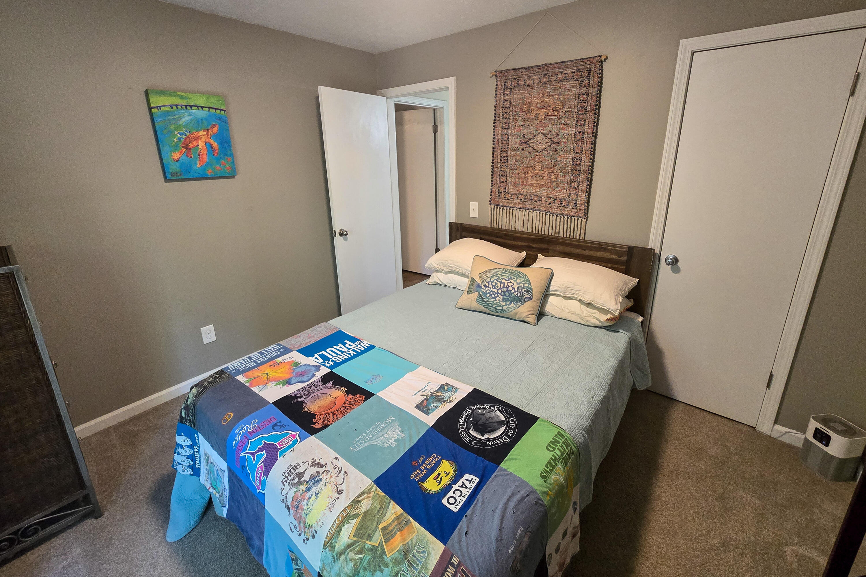 696 Phillips Drive Freeport, FL 32439 - Photo 22 of 49 a bedroom with a bed and a table in it