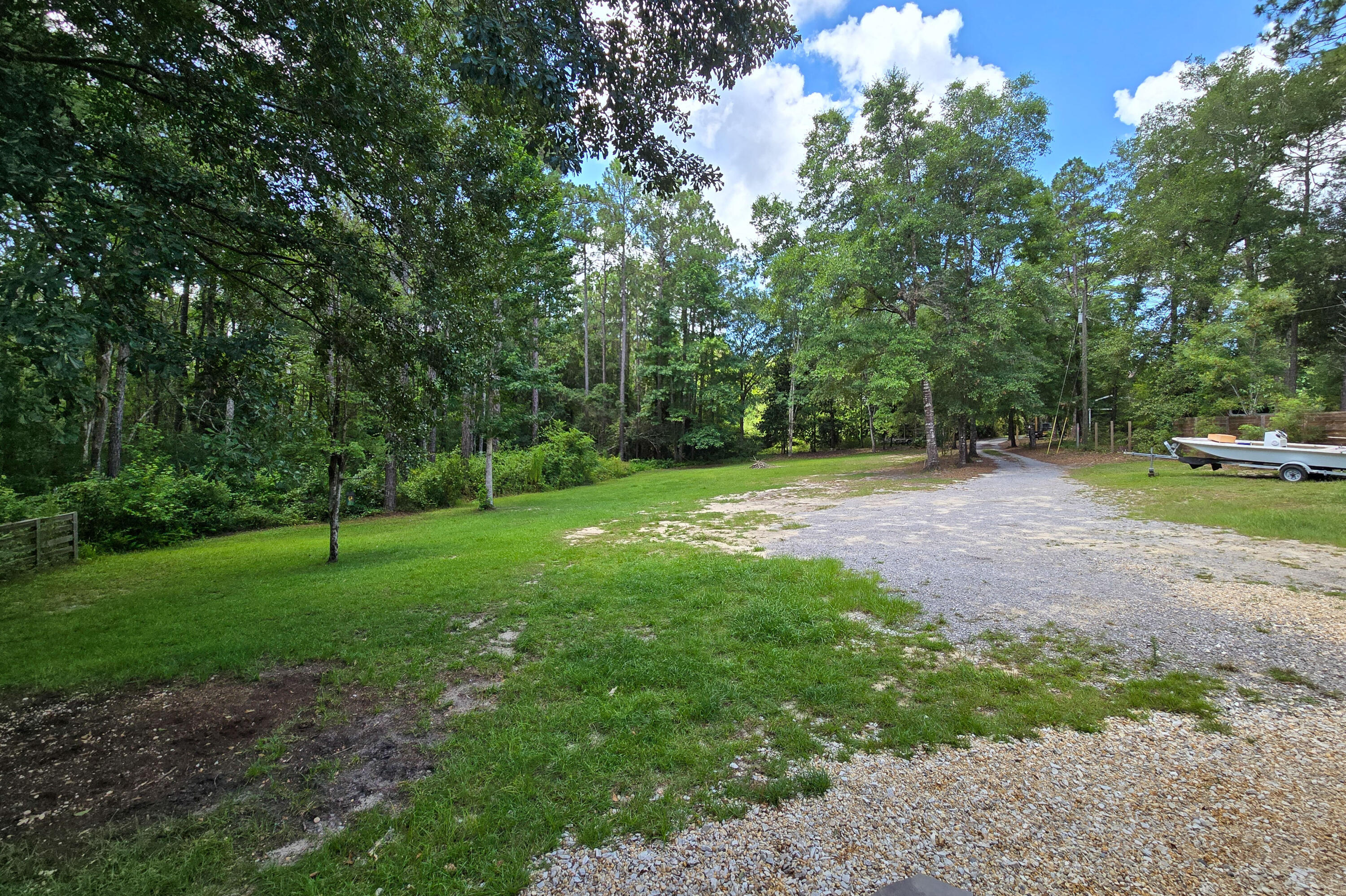 696 Phillips Drive Freeport, FL 32439 - Photo 41 of 49 a view of an outdoor space with a lake view