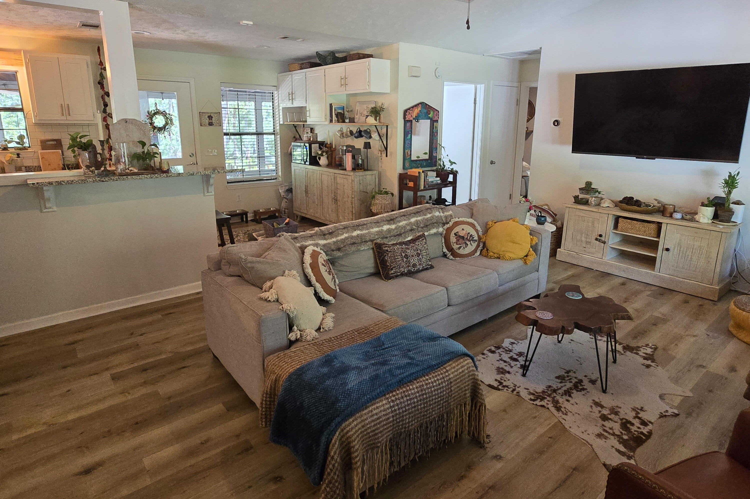 696 Phillips Drive Freeport, FL 32439 - Photo 6 of 49 a living room with furniture and a flat screen tv
