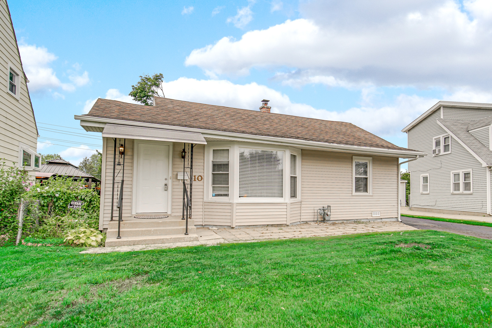 a front view of house with yard