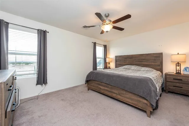 a kitchen with a sink a stove and a refrigerator