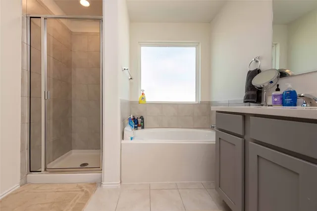 a bedroom with a bed and furniture