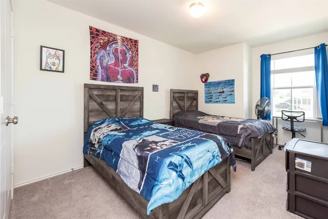 a bathroom with a bathtub sink and mirror