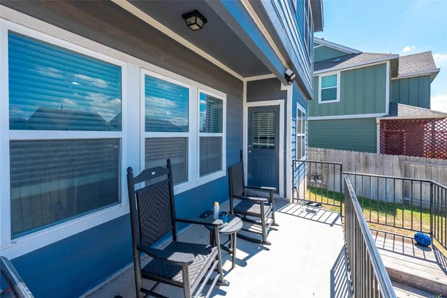 a view of a balcony with a sink