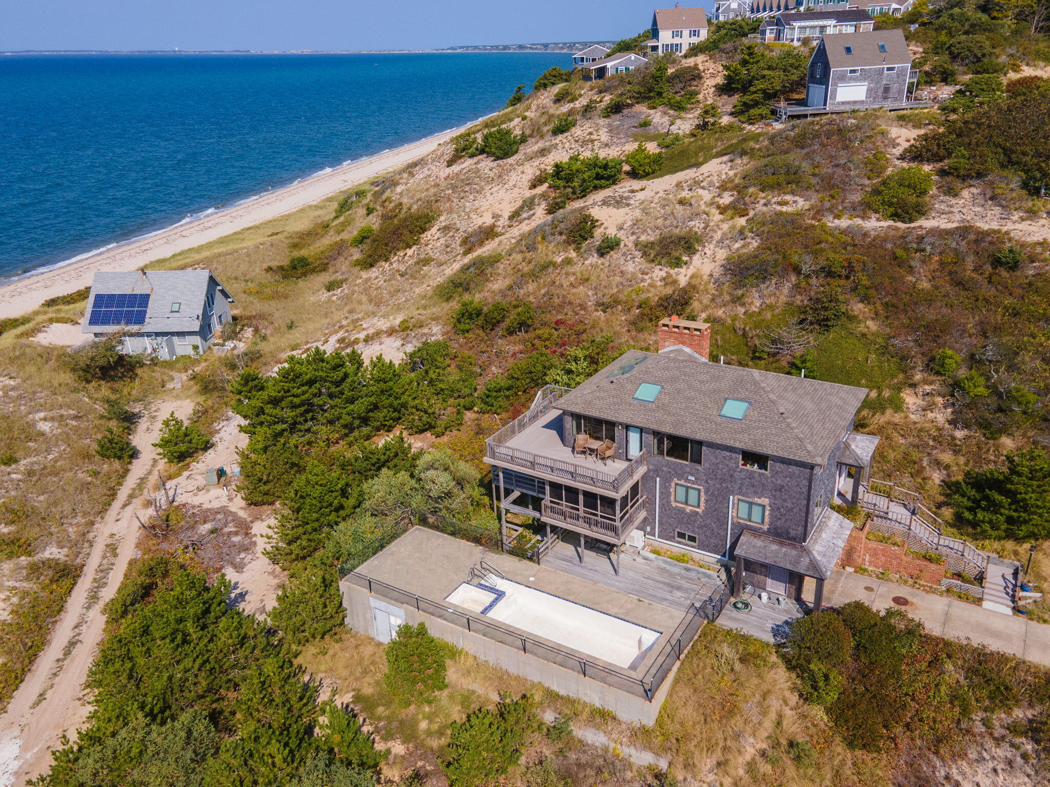 52 Corn Hill Road Truro, MA 02666 - Photo 70 of 74 an aerial view of a house with a yard