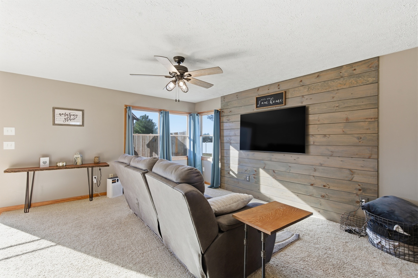 2216 North 2929th Road Marseilles, IL 61341 - Photo 12 of 49 a living room with furniture and a flat screen tv