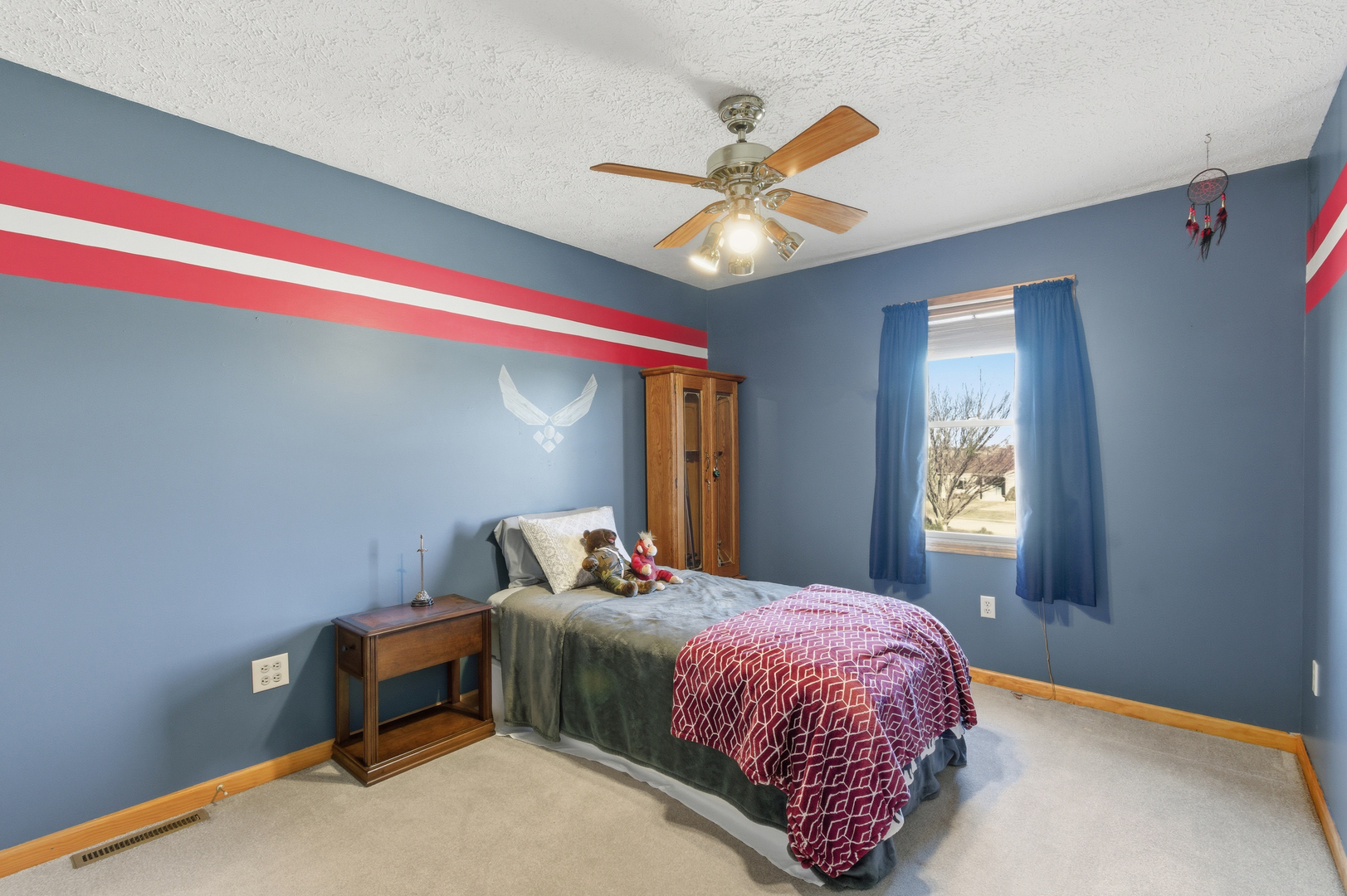 2216 North 2929th Road Marseilles, IL 61341 - Photo 27 of 49 a bedroom with a bed and a chandelier