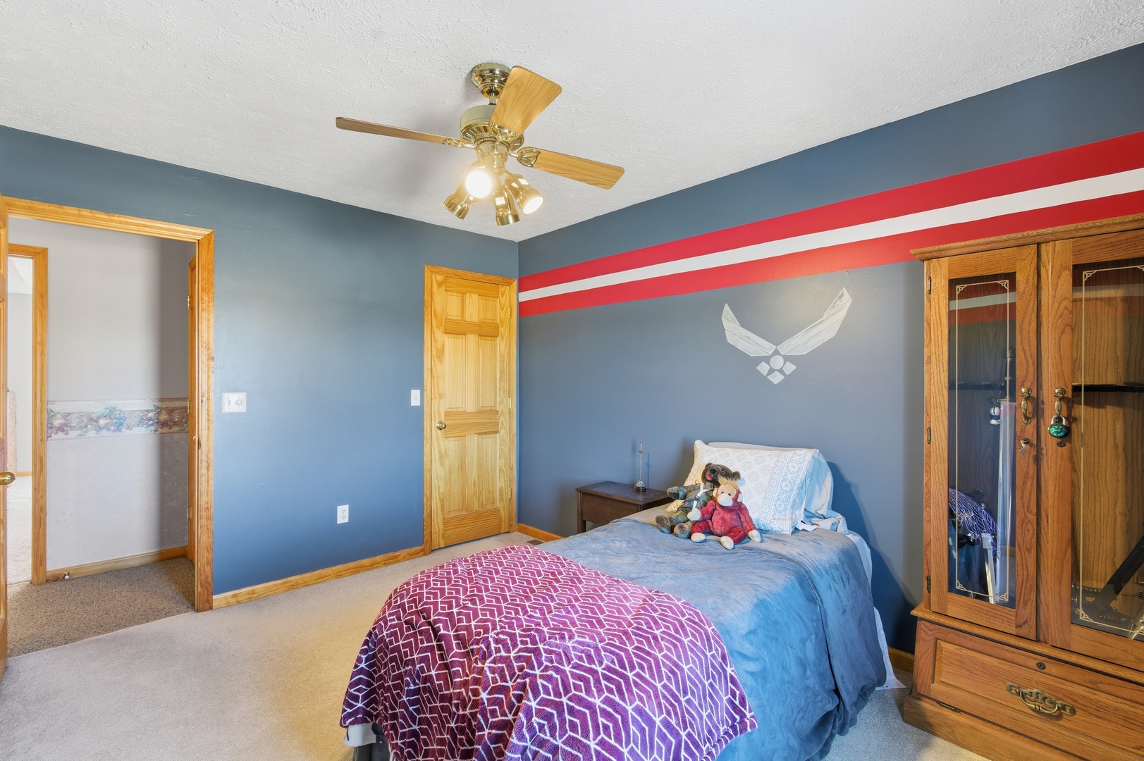 2216 North 2929th Road Marseilles, IL 61341 - Photo 28 of 49 a bedroom with a bed and a chandelier