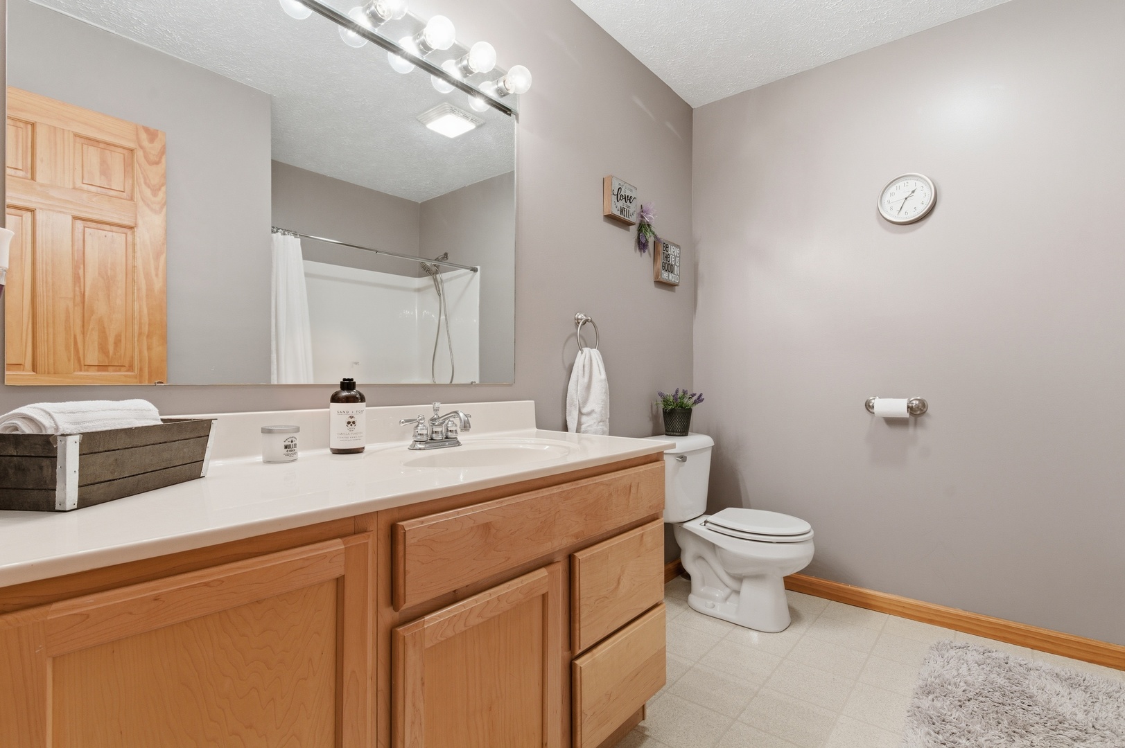 2216 North 2929th Road Marseilles, IL 61341 - Photo 29 of 49 a bathroom with a toilet sink and mirror