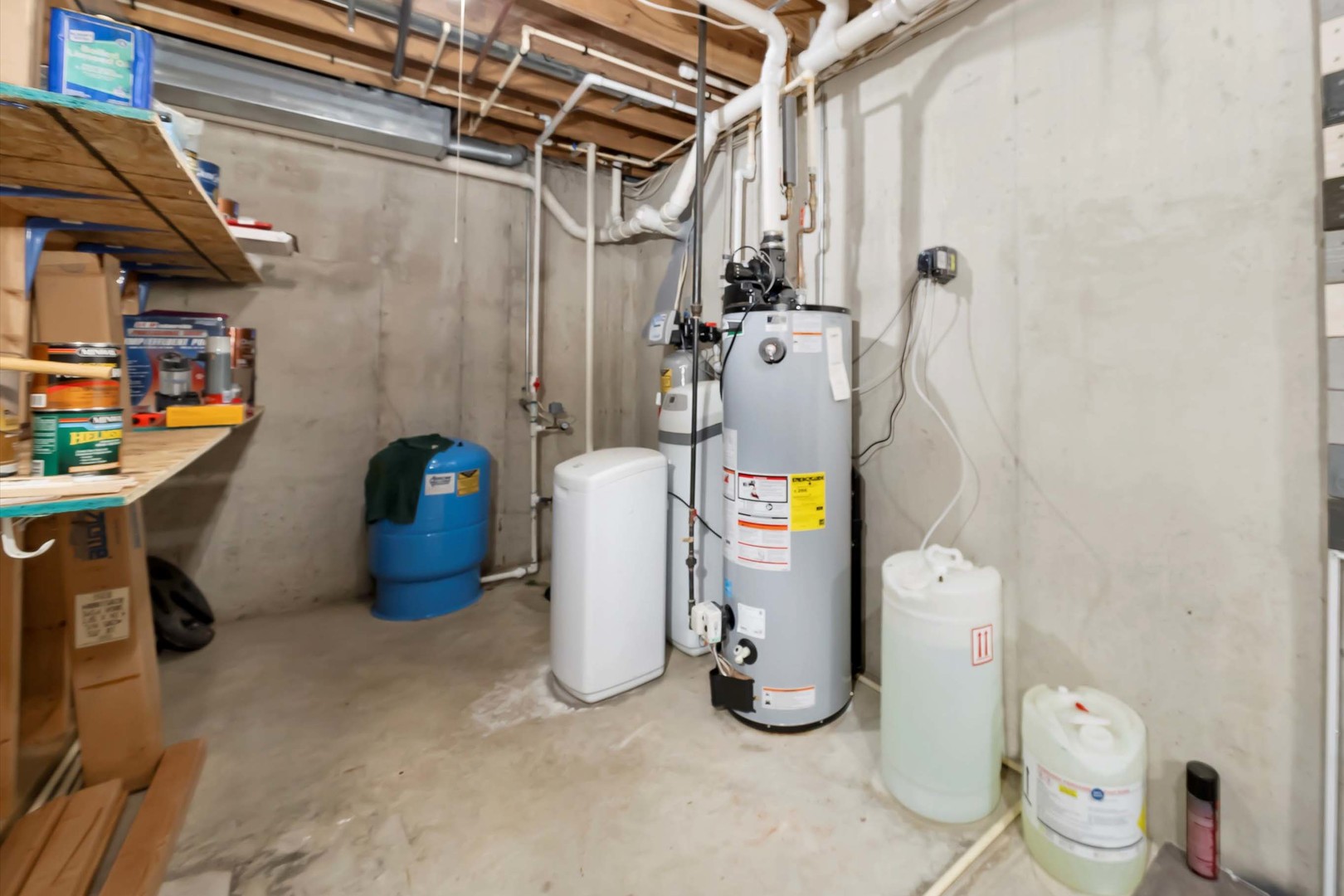 2216 North 2929th Road Marseilles, IL 61341 - Photo 37 of 49 a view of a storage & utility room with fridge and racks