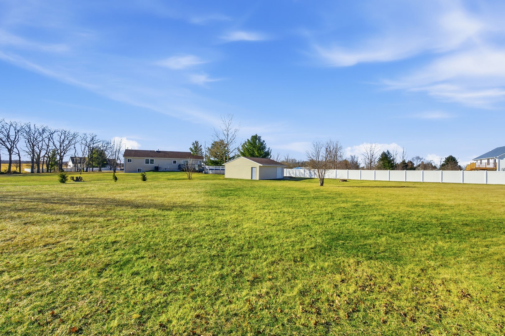 2216 North 2929th Road Marseilles, IL 61341 - Photo 38 of 49 a view of yard with swimming pool and green space