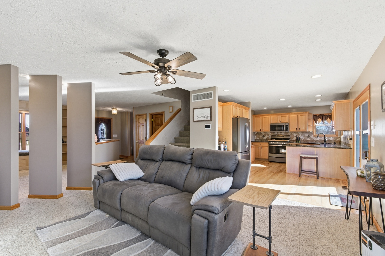 2216 North 2929th Road Marseilles, IL 61341 - Photo 10 of 49 a living room with furniture and kitchen view