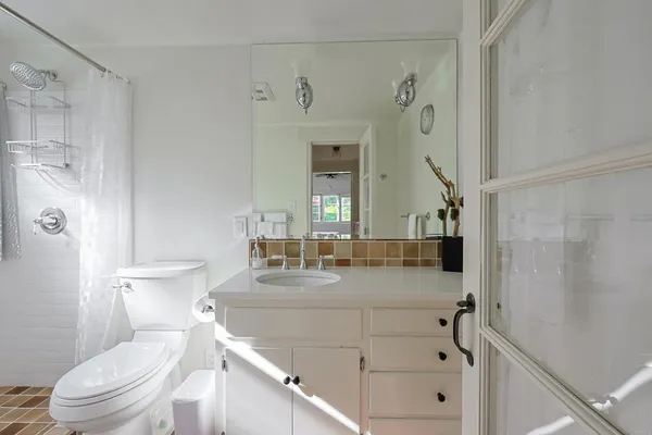 a view of a chairs and table in the patio