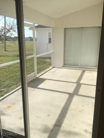 a bathroom with a glass door