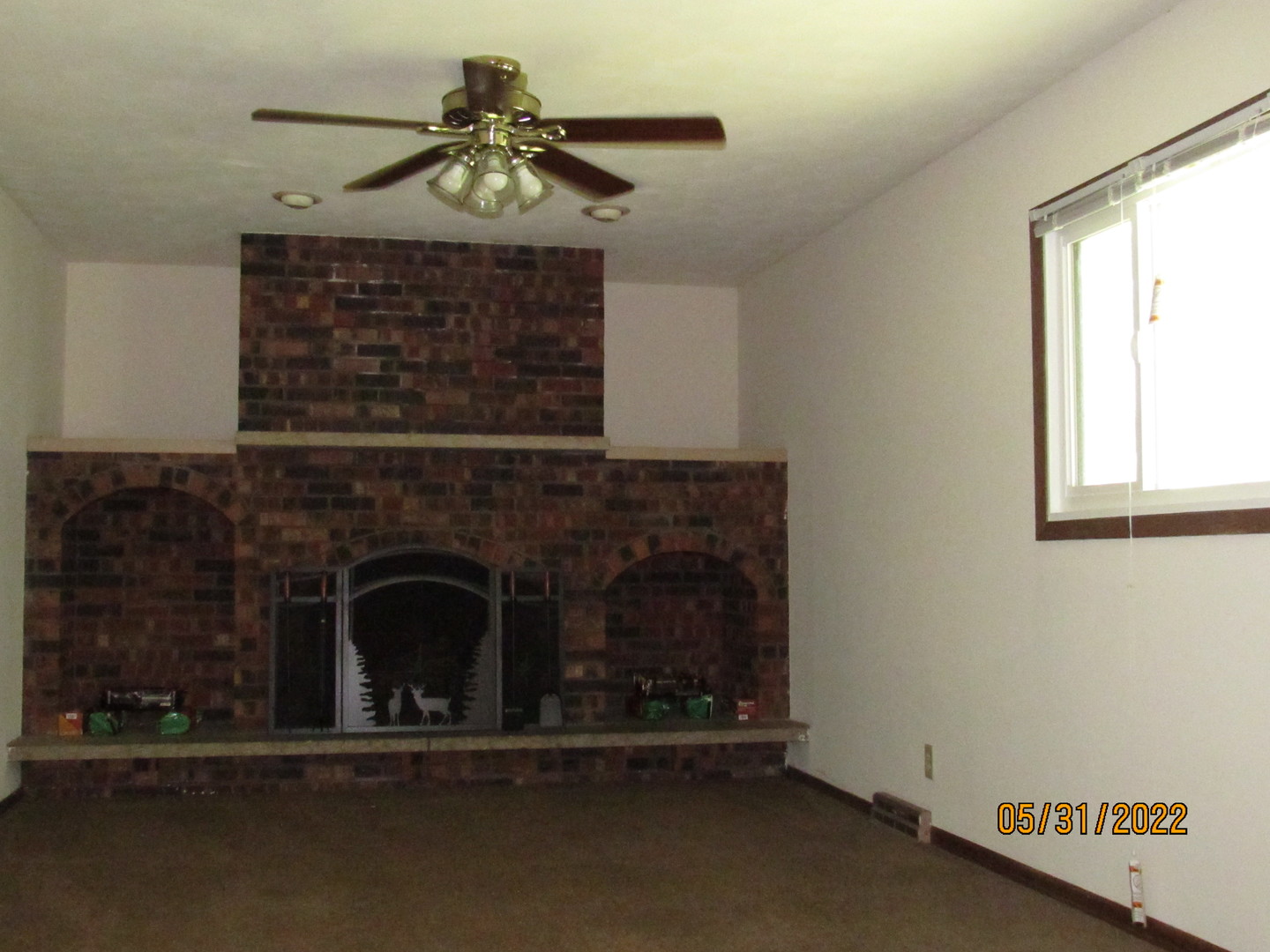 817 Normal Road DeKalb, IL 60115 - Photo 13 of 24 a living room with a fireplace