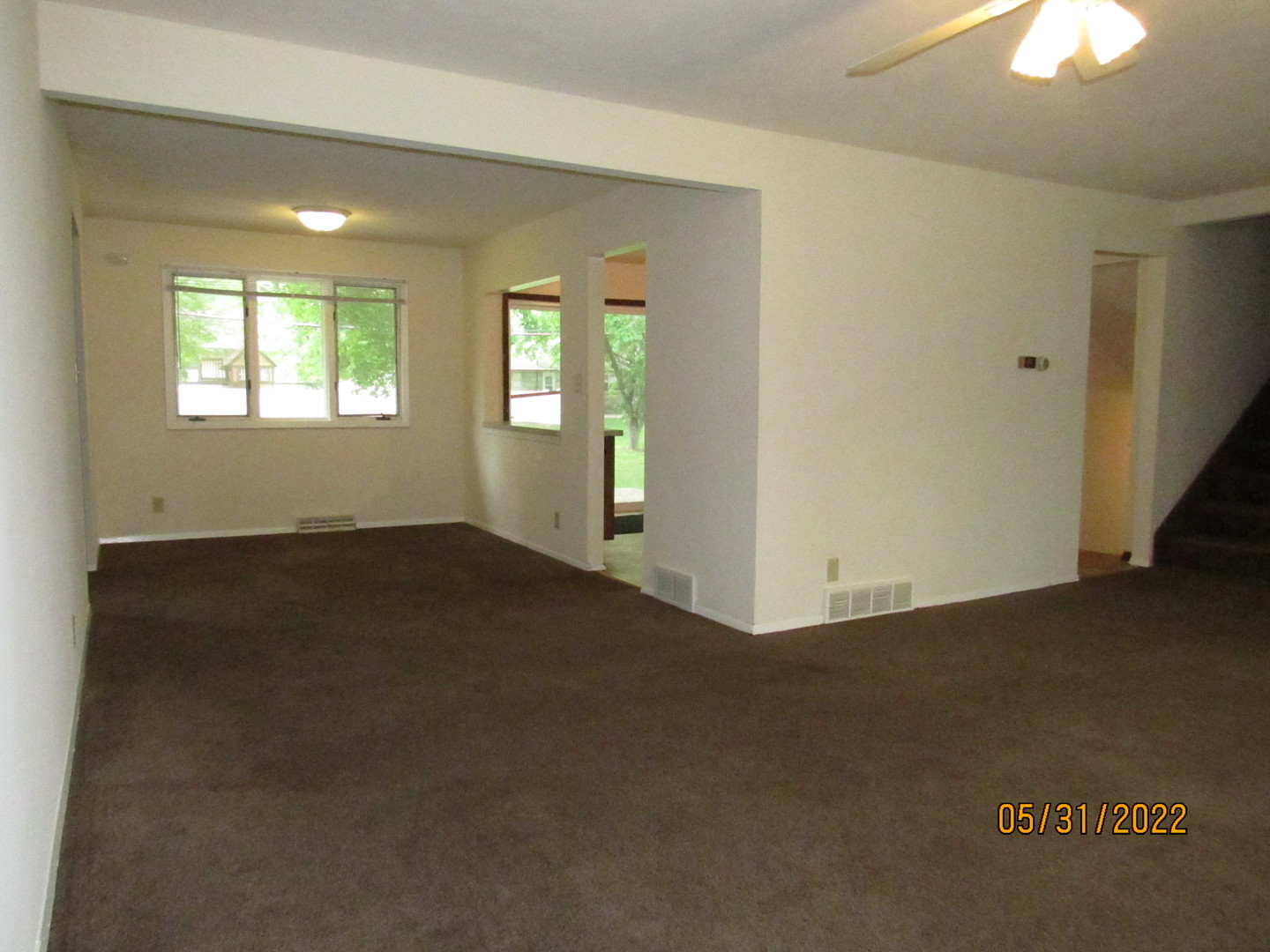 817 Normal Road DeKalb, IL 60115 - Photo 5 of 24 an empty room with windows
