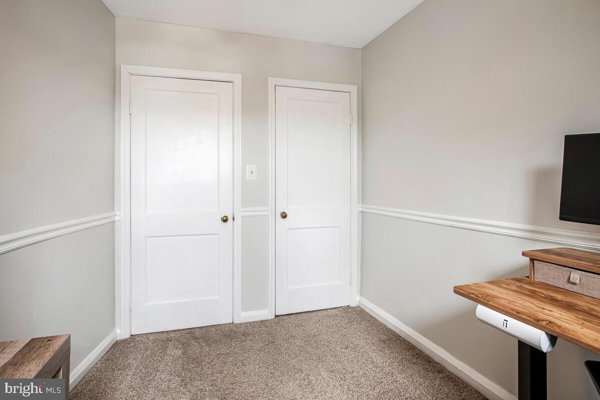 7215 Conley Street Baltimore, MD 21224 - Photo 26 of 38 a view of a livingroom with a flat screen tv
